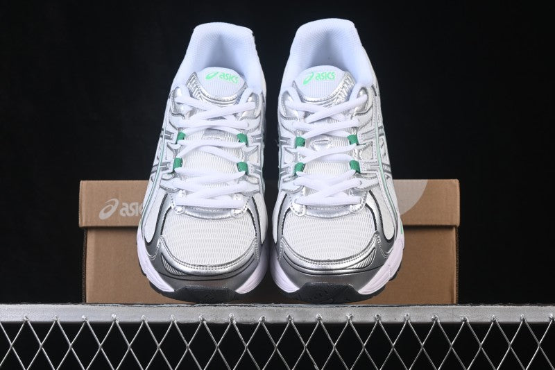 Baskets running blanches et vertes pour homme
