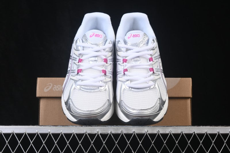 Baskets running blanches à détails roses pour homme
