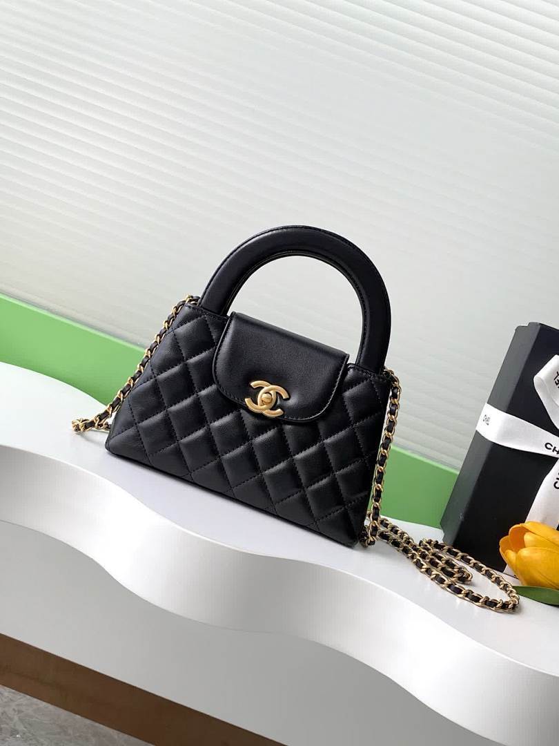 Petit sac matelassé noir à anse pour femme