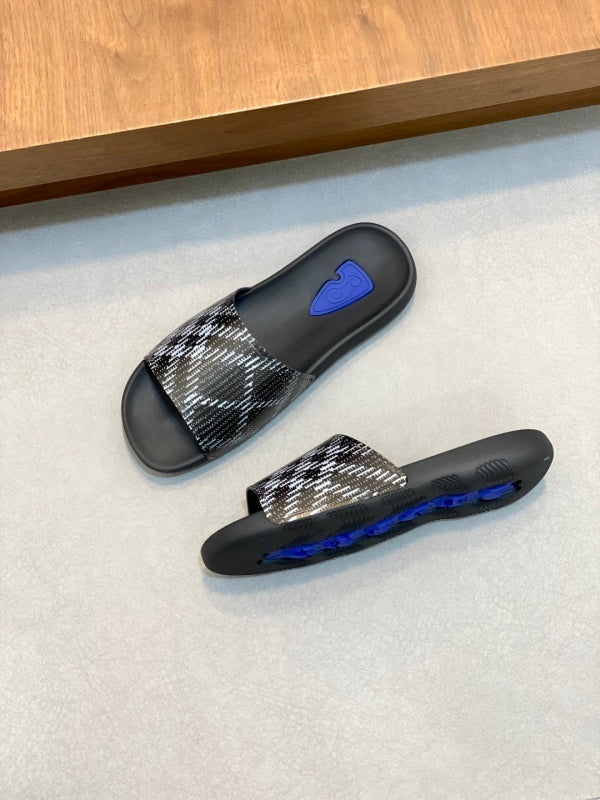 Claquettes noires à carreaux pour homme