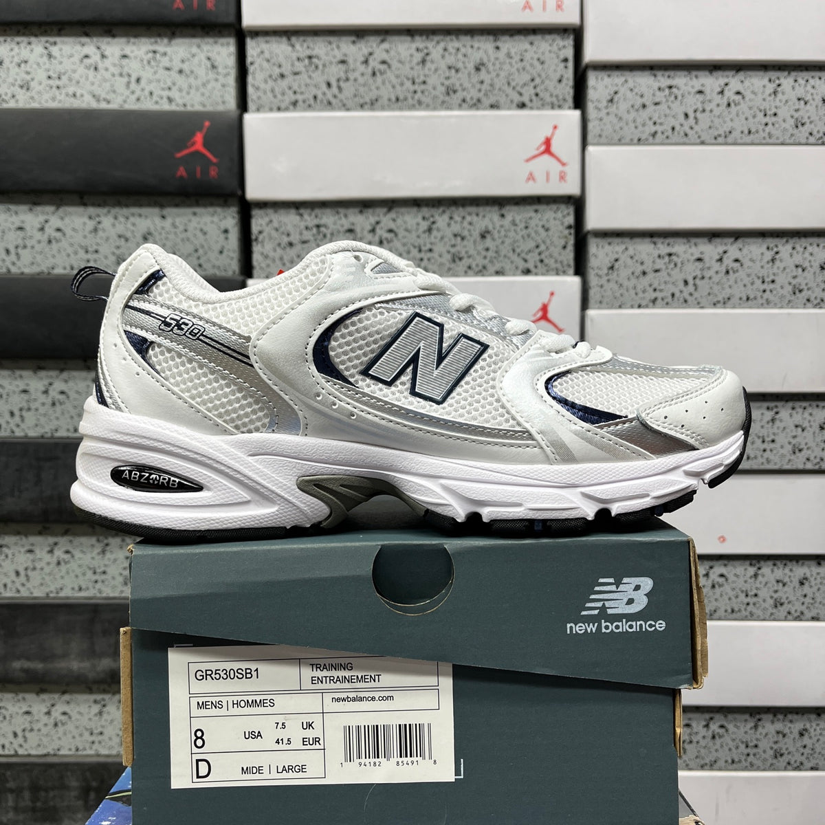 Baskets running argentées et blanches pour homme