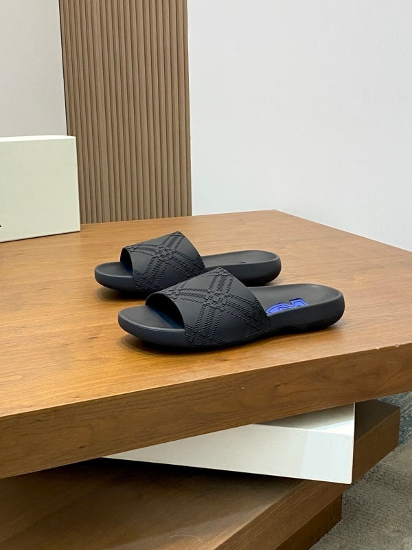 Claquettes noires pour homme