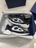 Baskets noires et blanches à motif pour homme